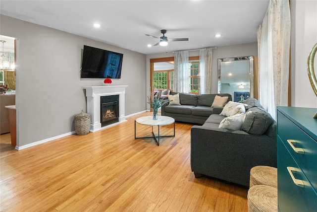 16 Lyncrest Rd, Cortlandt Manor, NY 10567 - living area with ceiling fan, a glass covered fireplace, light wood-type flooring, and recessed lighting