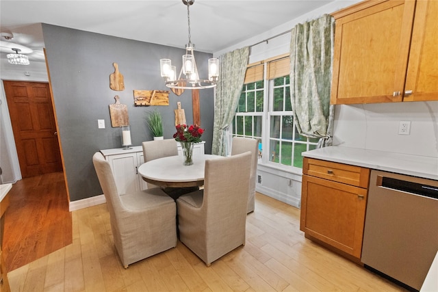 16 Lyncrest Rd, Cortlandt Manor, NY 10567 - dining room with a chandelier and light wood finished floors