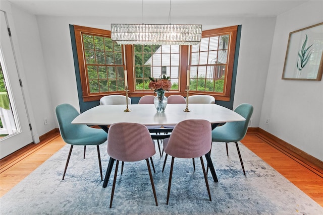 16 Lyncrest Rd, Cortlandt Manor, NY 10567 - dining room with wood finished floors and a chandelier