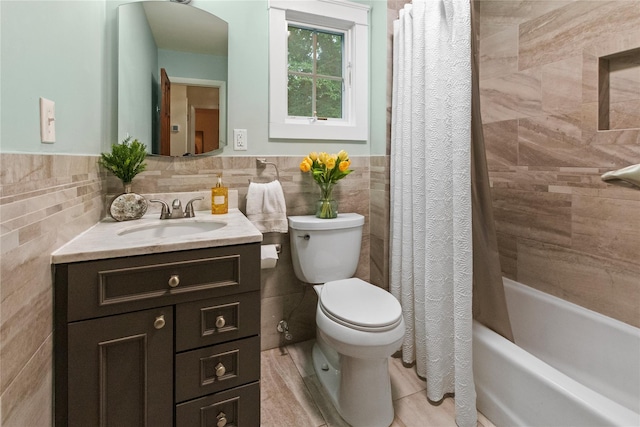 16 Lyncrest Rd, Cortlandt Manor, NY 10567 - bathroom with tile walls, vanity, wainscoting, and shower / tub combo with curtain