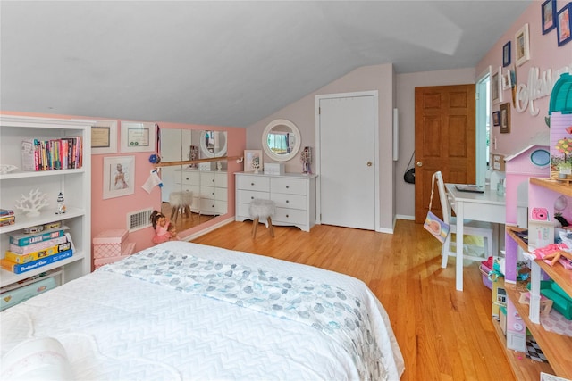 16 Lyncrest Rd, Cortlandt Manor, NY 10567 - bedroom featuring wood finished floors and vaulted ceiling
