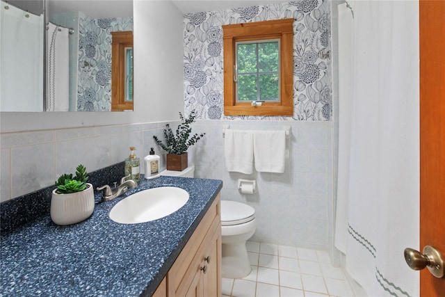 16 Lyncrest Rd, Cortlandt Manor, NY 10567 - bathroom with vanity, tile patterned floors, curtained shower, tile walls, and wainscoting