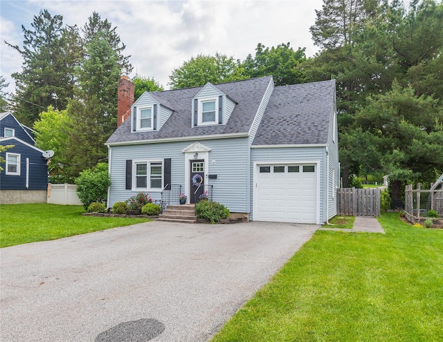 129 S St, Warwick, NY 10990 - new england style home with an attached garage, driveway, a chimney, and a shingled roof