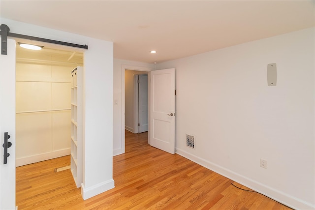 129 S St, Warwick, NY 10990 - unfurnished bedroom with light wood finished floors, baseboards, recessed lighting, and a closet
