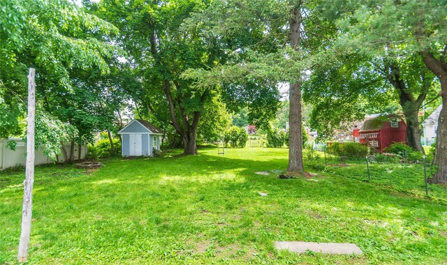 129 S St, Warwick, NY 10990 - view of green lawn with view of wooded area