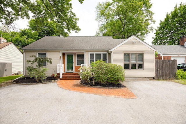 924 Violet Ave, Hyde Park, NY 12538 - ranch-style home with asphalt driveway and a shingled roof