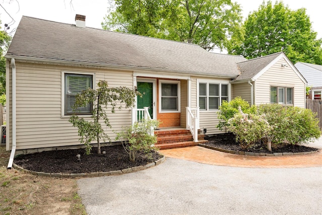 924 Violet Ave, Hyde Park, NY 12538 - cape cod-style house with a chimney and a shingled roof