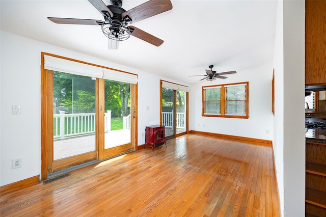 924 Violet Ave, Hyde Park, NY 12538 - empty room with light wood-type flooring, baseboards, and a ceiling fan