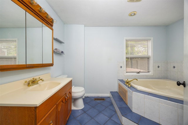 924 Violet Ave, Hyde Park, NY 12538 - bathroom with toilet, a garden tub, vanity, tile patterned floors, and baseboards