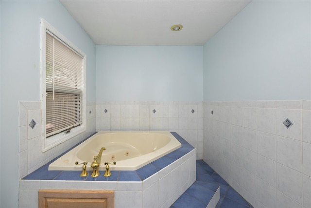 924 Violet Ave, Hyde Park, NY 12538 - full bath with a tub with jets and tile patterned floors