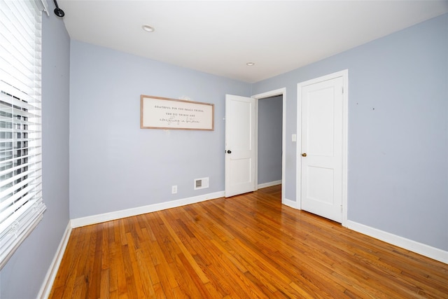 924 Violet Ave, Hyde Park, NY 12538 - unfurnished room with wood finished floors and baseboards
