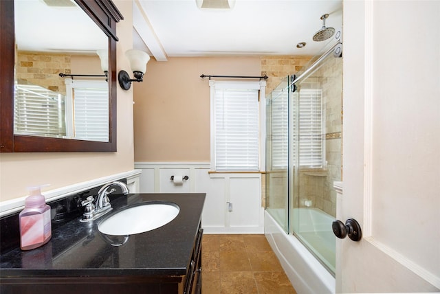 924 Violet Ave, Hyde Park, NY 12538 - full bath with vanity, combined bath / shower with glass door, and wainscoting