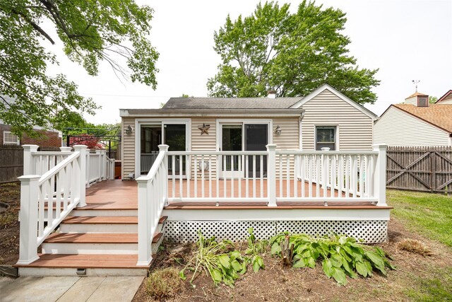 924 Violet Ave, Hyde Park, NY 12538 - back of property featuring a deck and a shingled roof