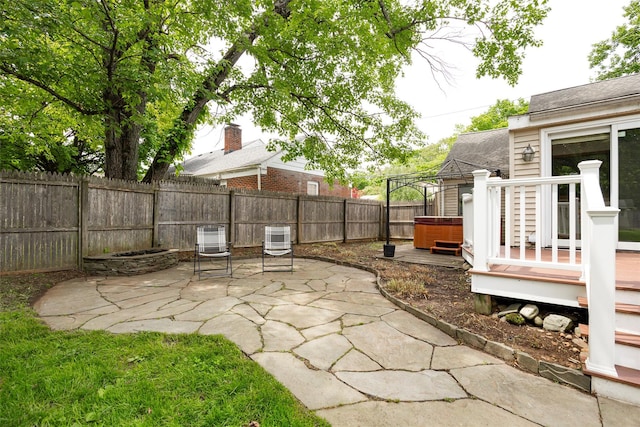 924 Violet Ave, Hyde Park, NY 12538 - fenced backyard with a hot tub, a patio area, and a deck