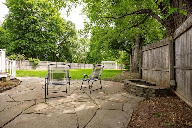 924 Violet Ave, Hyde Park, NY 12538 - view of patio featuring a fire pit