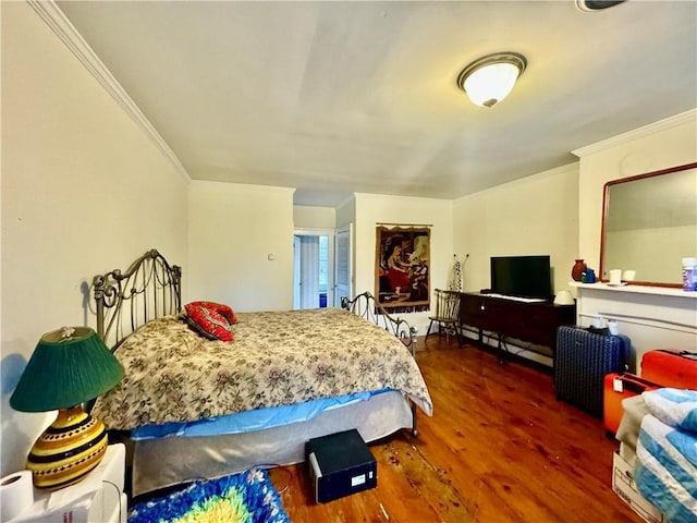 255 Howells Rd, Middletown, NY 10940 - bedroom with ornamental molding and wood finished floors