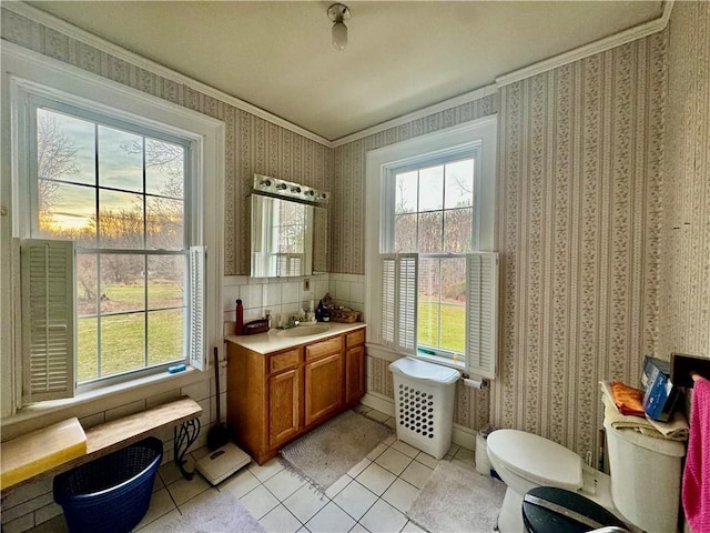 255 Howells Rd, Middletown, NY 10940 - bathroom with crown molding, wallpapered walls, vanity, tile patterned floors, and toilet