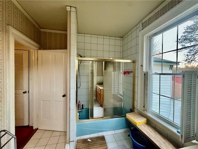 255 Howells Rd, Middletown, NY 10940 - full bath with tile patterned floors, plenty of natural light, and enclosed tub / shower combo