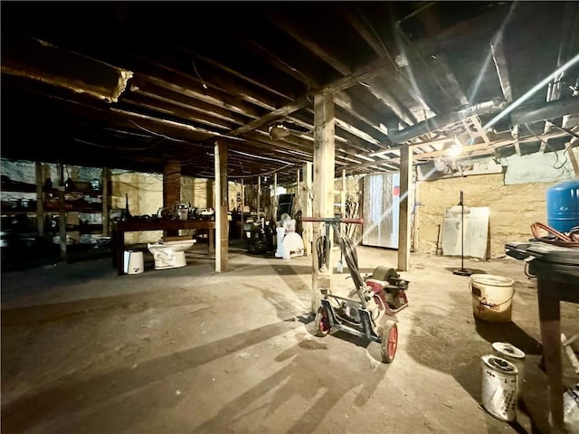255 Howells Rd, Middletown, NY 10940 - unfinished below grade area with a water pressure tank