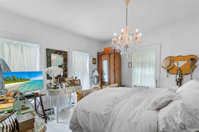 83 Tennanah Lake Rd, Roscoe, NY 12776 - bedroom featuring a chandelier