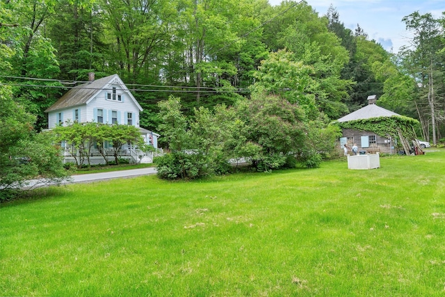 83 Tennanah Lake Rd, Roscoe, NY 12776 - view of grassy yard featuring a forest view
