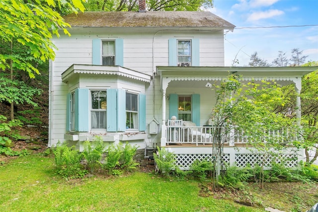 83 Tennanah Lake Rd, Roscoe, NY 12776 - view of front facade with a porch