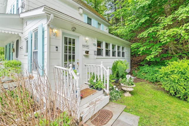 83 Tennanah Lake Rd, Roscoe, NY 12776 - property entrance with a yard