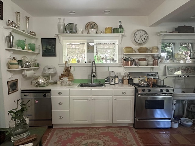 83 Tennanah Lake Rd, Roscoe, NY 12776 - kitchen featuring stainless steel gas stove, open shelves, dishwashing machine, light countertops, and white cabinets