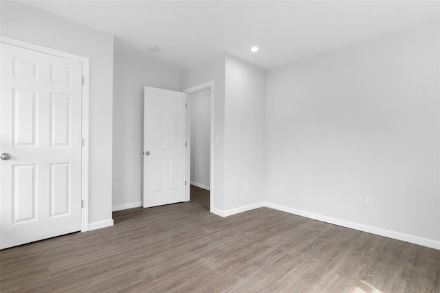 8 Chestnut St, Middletown, NY 10940 - unfurnished bedroom featuring wood finished floors, baseboards, and recessed lighting