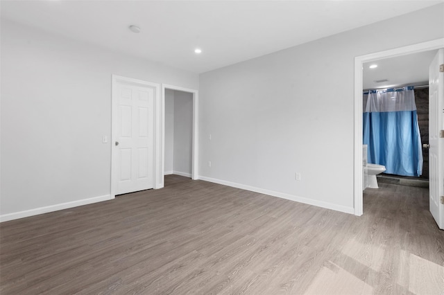 8 Chestnut St, Middletown, NY 10940 - empty room with wood finished floors, recessed lighting, and baseboards