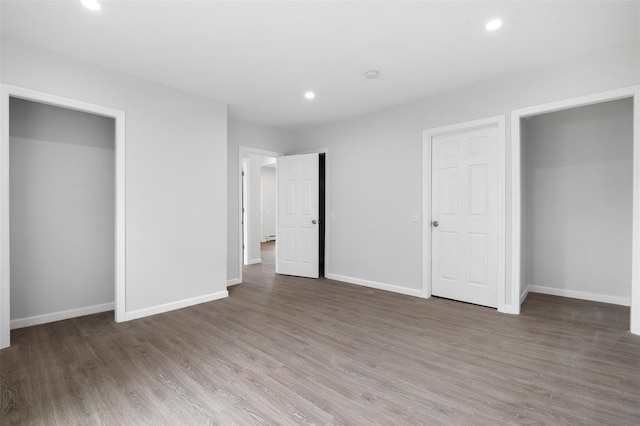 8 Chestnut St, Middletown, NY 10940 - unfurnished bedroom with wood finished floors, baseboards, and recessed lighting