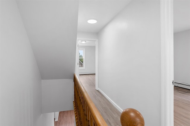 8 Chestnut St, Middletown, NY 10940 - staircase with wood finished floors and baseboard heating