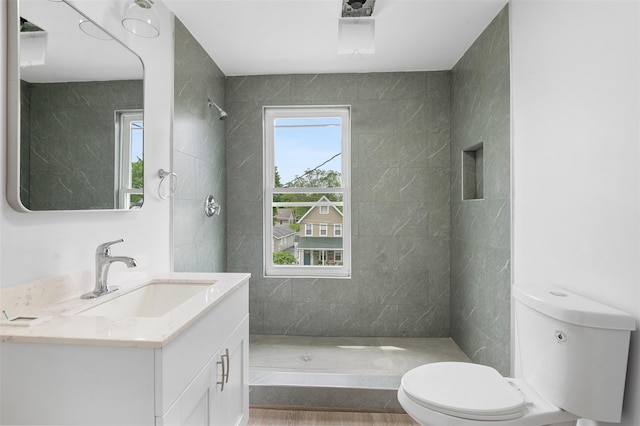 8 Chestnut St, Middletown, NY 10940 - full bath featuring toilet, vanity, and a tile shower