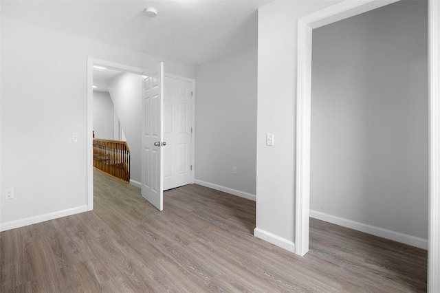 8 Chestnut St, Middletown, NY 10940 - unfurnished bedroom featuring light wood-type flooring and baseboards