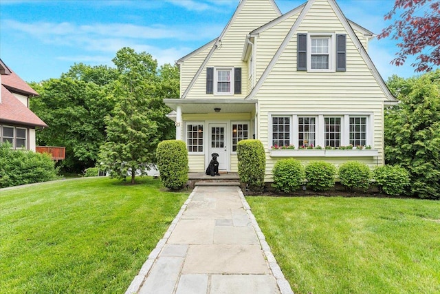 21 Chester Pl, New Rochelle, NY 10801 - view of front of property with a front lawn