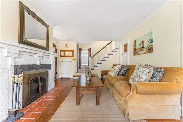 21 Chester Pl, New Rochelle, NY 10801 - living room with dark wood finished floors, a fireplace, stairway, and crown molding