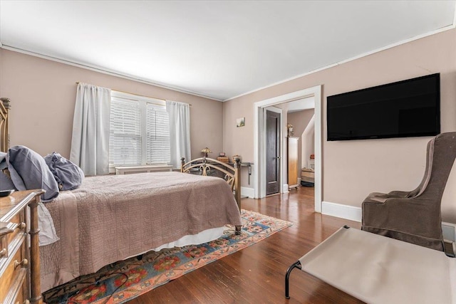 21 Chester Pl, New Rochelle, NY 10801 - bedroom featuring wood finished floors, crown molding, and baseboards