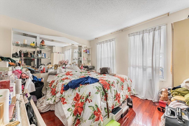 977 E 179th St, Bronx, NY 10460 - bedroom featuring wood finished floors and a textured ceiling