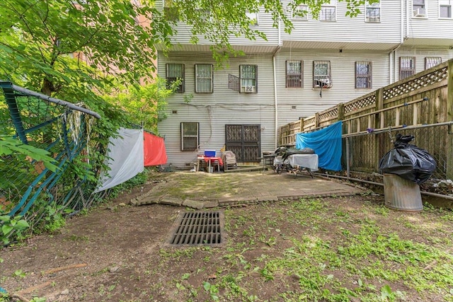 977 E 179th St, Bronx, NY 10460 - back of property with a patio area and a fenced backyard