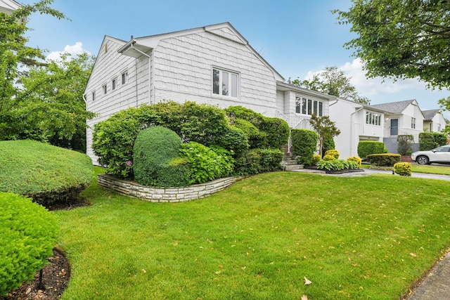 904 Woodmere Dr, North Woodmere, NY 11581 - view of home's exterior featuring a lawn