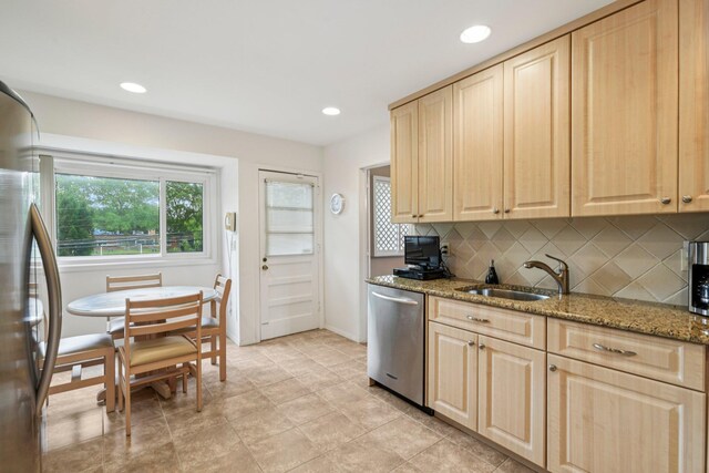 904 Woodmere Dr, North Woodmere, NY 11581 - kitchen featuring stainless steel appliances, light brown cabinetry, a sink, decorative backsplash, and recessed lighting