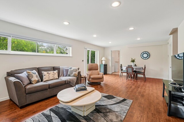 904 Woodmere Dr, North Woodmere, NY 11581 - living area with wood finished floors, recessed lighting, and baseboards