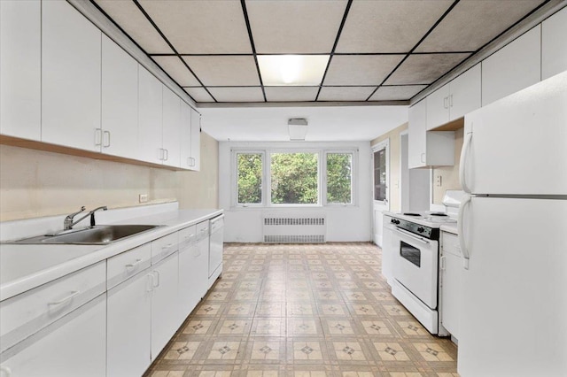 18 Overlook Ln, Plainview, NY 11803 - kitchen with white appliances, radiator heating unit, a sink, light countertops, and white cabinets