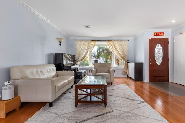 30 Eaton Rd, Syosset, NY 11791 - living area featuring ornamental molding and wood finished floors