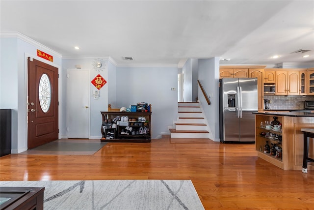 30 Eaton Rd, Syosset, NY 11791 - foyer featuring stairs, ornamental molding, baseboards, light wood-style flooring, and recessed lighting