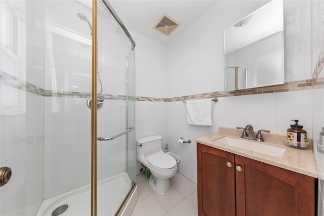 30 Eaton Rd, Syosset, NY 11791 - bathroom featuring vanity, a stall shower, tile walls, toilet, and tile patterned flooring