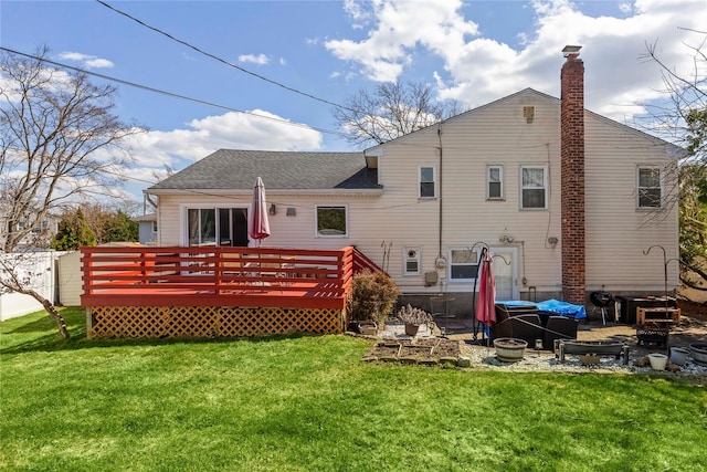 30 Eaton Rd, Syosset, NY 11791 - back of property featuring a chimney, a deck, a yard, and roof with shingles