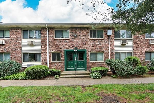 2449 Union Blvd Unit 24A, Islip, NY 11751 - view of front facade featuring brick siding