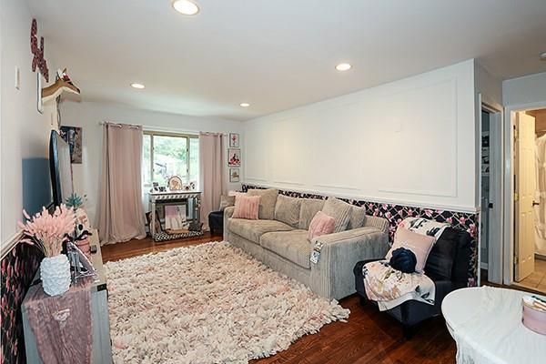 2449 Union Blvd Unit 24A, Islip, NY 11751 - living room featuring dark wood-style floors and recessed lighting