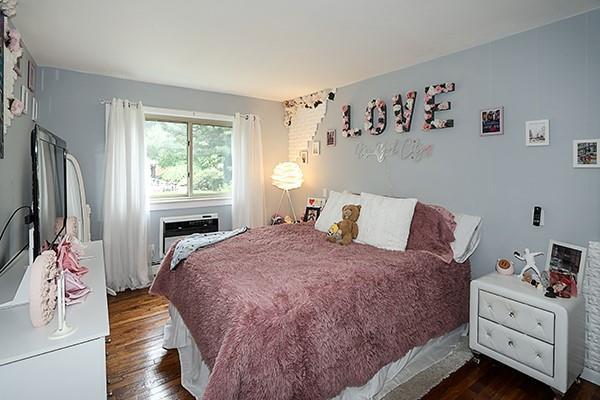 2449 Union Blvd Unit 24A, Islip, NY 11751 - bedroom with dark wood finished floors